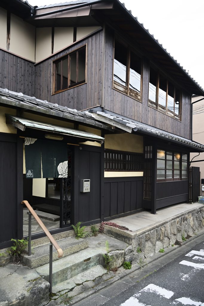 Entrance to the 120-year-old machiya housing SASHIKO BORO ARCHIVE near Fushimi Inari, Kyoto